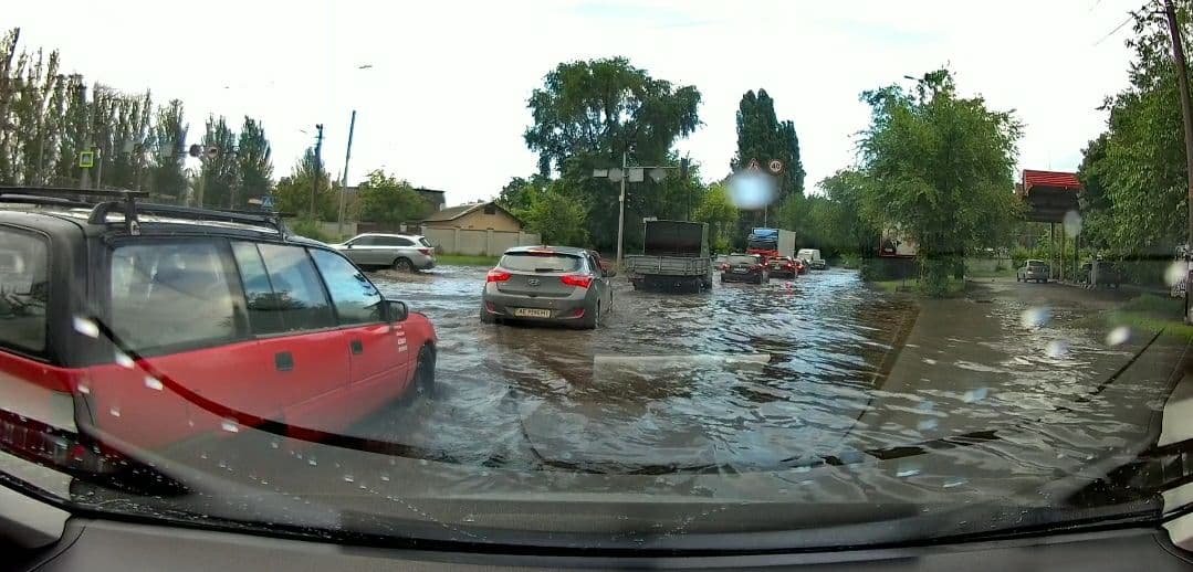 В Каменском мощный ливень затопил центр города, фото-4